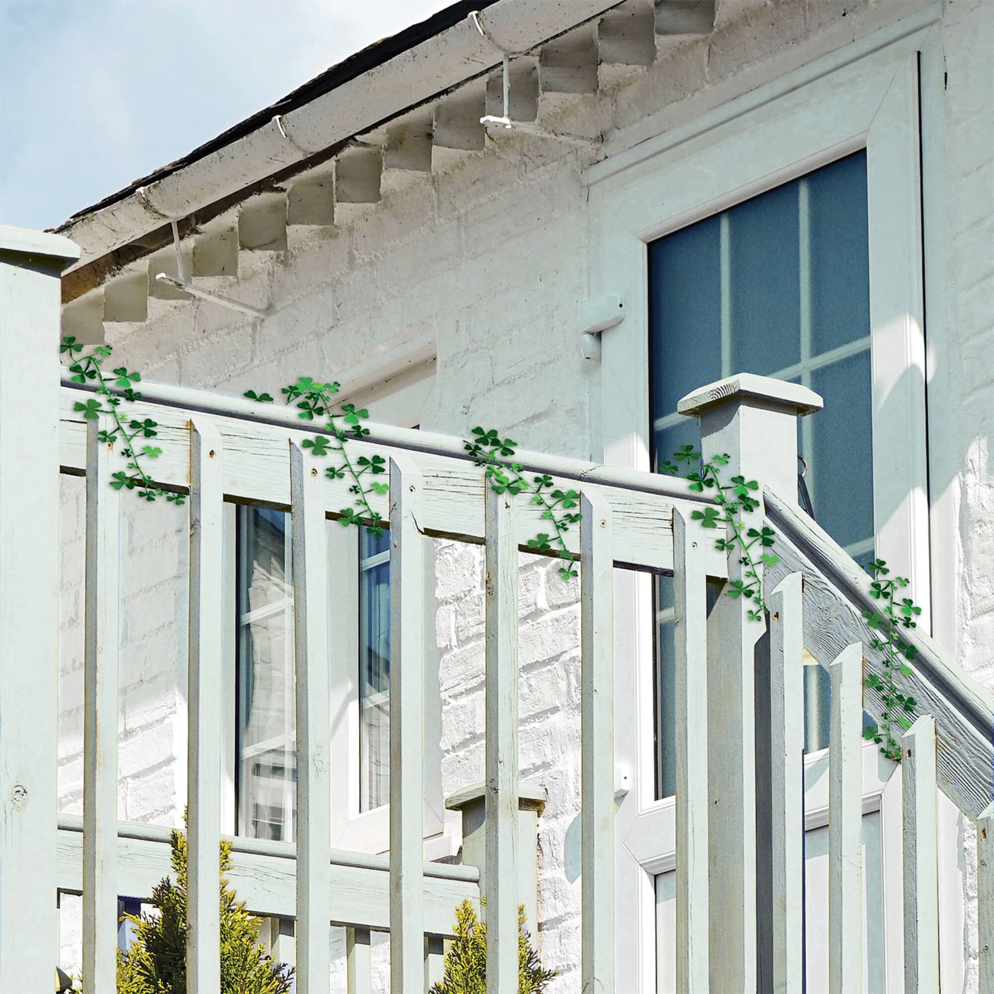 Beistle 25ft. Green Gleam 'N Flex Shamrock Garlands, 2ct.